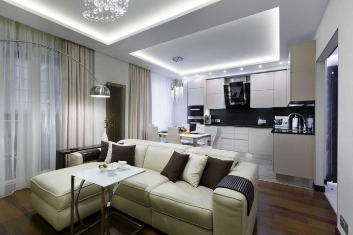 kuchnia-salon 20 m kw. z sofą przy oknie