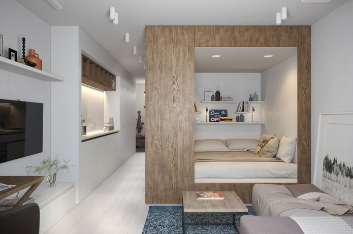miejsce do spania we wnętrzu apartamentu typu studio