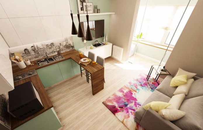 wnętrze apartamentu typu studio z balkonem