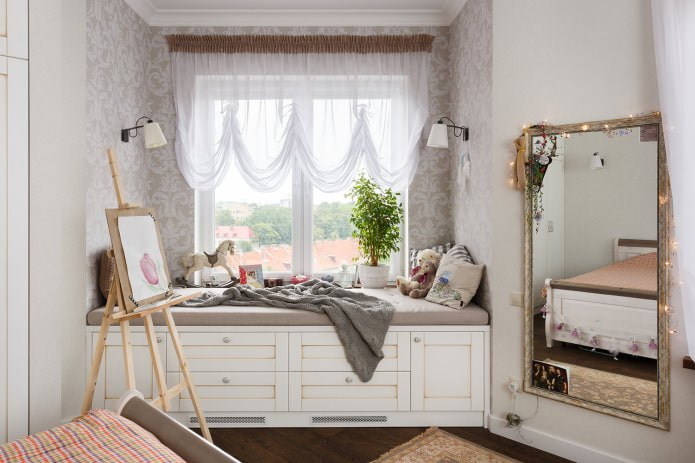 łóżko z szufladami w pokoju dziecięcym