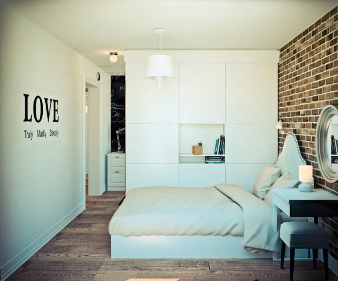 sypialnia w projekcie narożnego jednopokojowego mieszkania o powierzchni 32 m2.