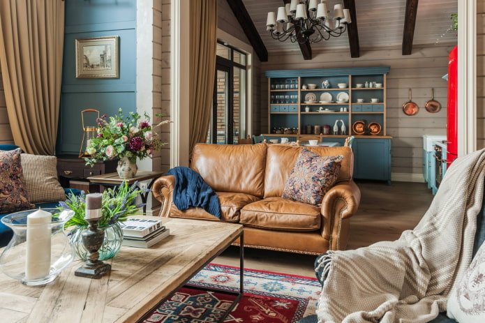 skórzana sofa z kocem i poduszką