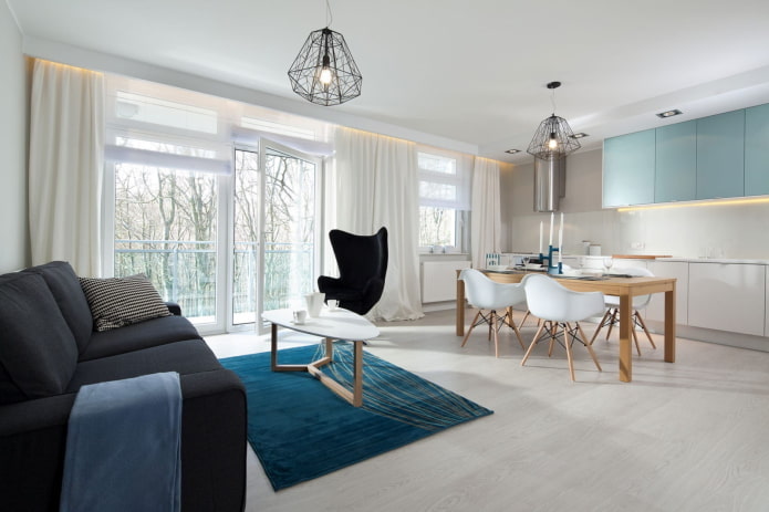 Kuchnia-salon w minimalistycznym stylu
