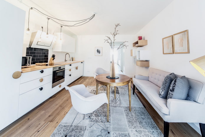 sofa we wnętrzu kuchni w stylu skandynawskim