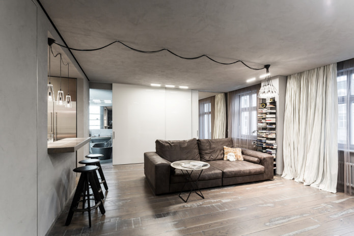 skórzana sofa we wnętrzu w stylu loft