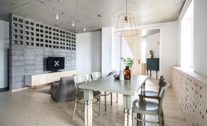 szary stół we wnętrzu w stylu loft